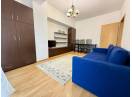 Apartament central cu 2 camere decomandate, balcon si parcare