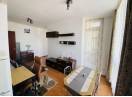 Apartament nou cu 2 camere, confort I, etaj intermediar, finisat, mobilat si utilat, cu garaj, in Centru