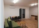 Apartament nou cu 2 camere decomandate, 60mp, etaj intermediar, finisat, mobilat si utilat, cu garaj si 2 balcoane